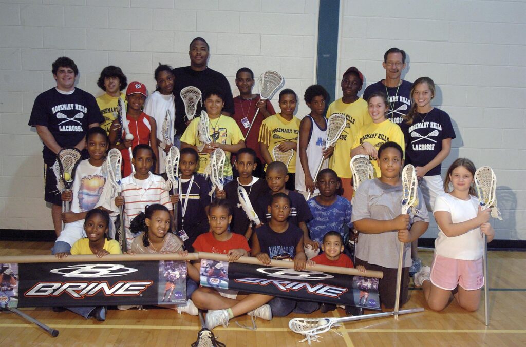 Slug:RosemaryLaxSP080305
Photo by Susan Whitney-Wilkerson
The Rosemary Hills Lacrosse Program teaches lacrosse to children at Rosemary Hills Park under the direction of Jeff Wagner Friday, July 29, 2005 in Silver Spring.